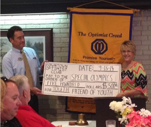 Former President Dan Derrington Presents The DTOC Special Olympics Donation to Kristie Anders