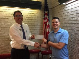 DTOC President Dan Derrington Presents FCA Area Director Jonathan Fulcher With Donation