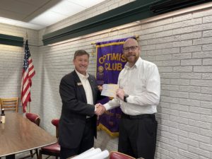 Photo of DTOC President Todd Pope presenting donations To Choctaw Area Council Director James Hulgan. Photo taken by Rives Photography
